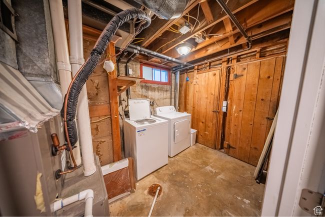 Laundry area with independent washer and dryer | Image 22