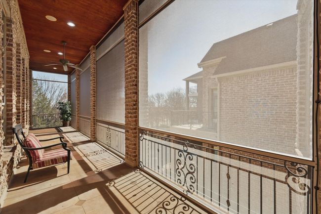 Another side of the main floor screened in patio. | Image 14