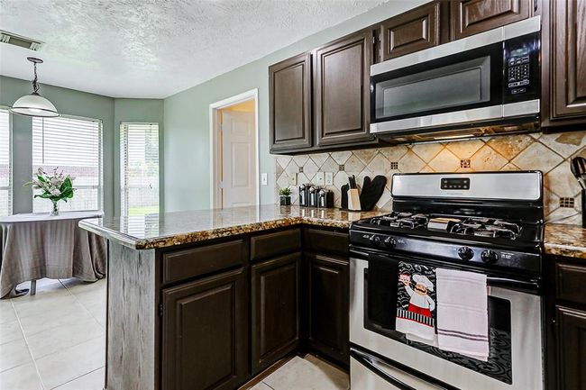 1410 Quiet Green Ct, House other with 3 bedrooms, 3 bathrooms and 2 parking in Houston TX | Image 16