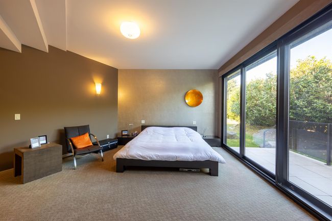 Carpeted bedroom with access to exterior | Image 24