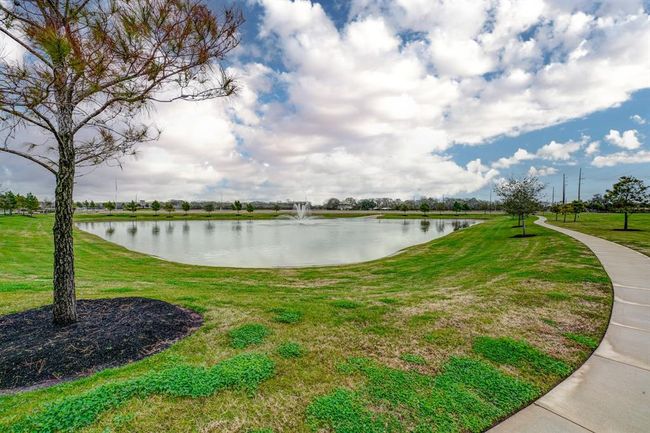 Family-friendly amenities include a five-acre park, recreation area with a splash pad, swimming pool, picnic area and green belts with walking paths. Plus, the subdivision is surrounded with restaurants, education opportunities, entertainment venues, shopping and more. | Image 17