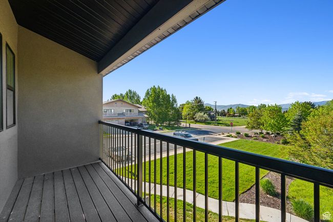 Balcony featuring a mountain view | Image 29