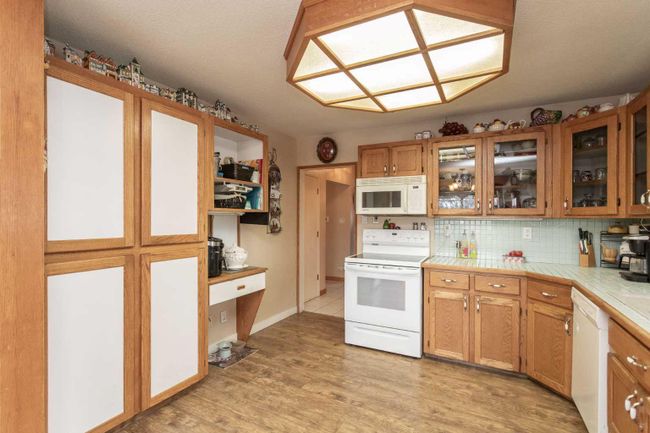 4302 Grandview Boulevard, Home with 5 bedrooms, 2 bathrooms and 4 parking in Red Deer AB | Image 10