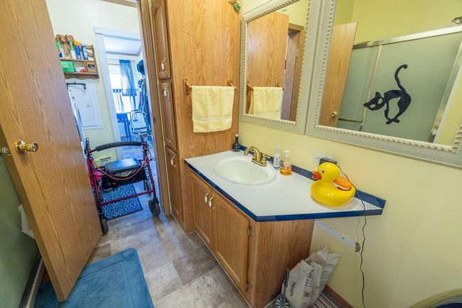 Full bath with a stall shower and vanity | Image 12