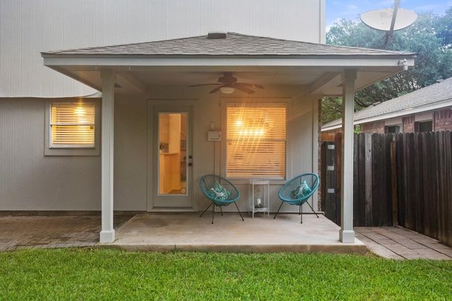 A great covered patio with an outdoor fan help to keep the evenings cool! | Image 30