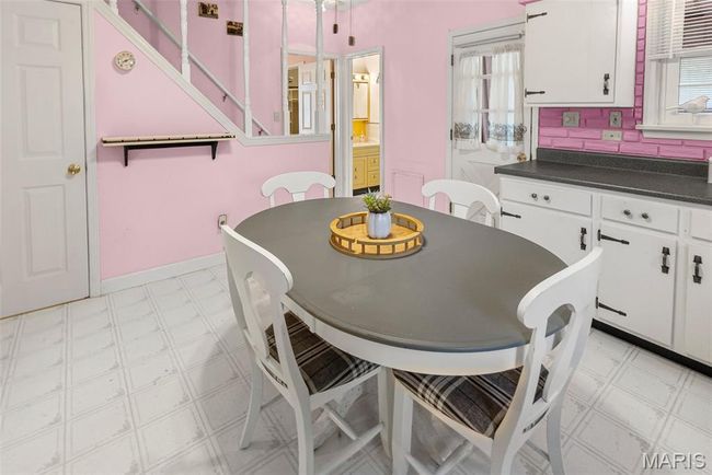 Dining area featuring light floors | Image 22