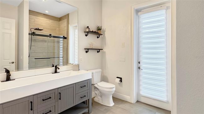 Main Floor Modern Pool Bathroom | Image 37