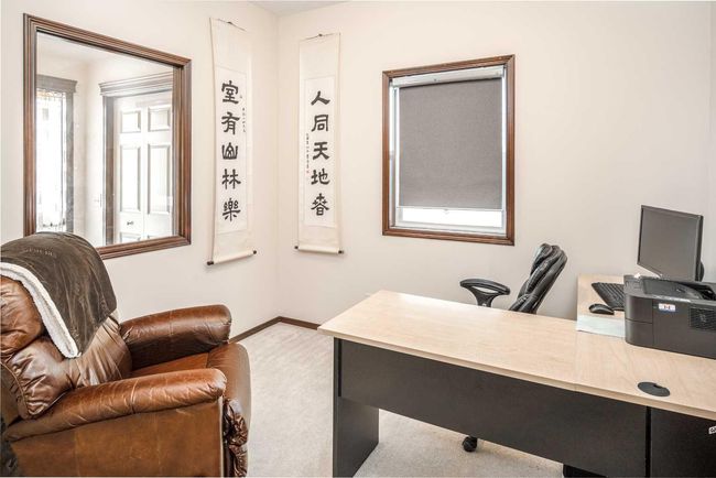 109 St Moritz Place Sw, House other with 3 bedrooms, 3 bathrooms and 4 parking in Calgary AB | Image 9