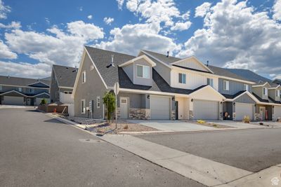 View of front of house featuring a garage | Image 1