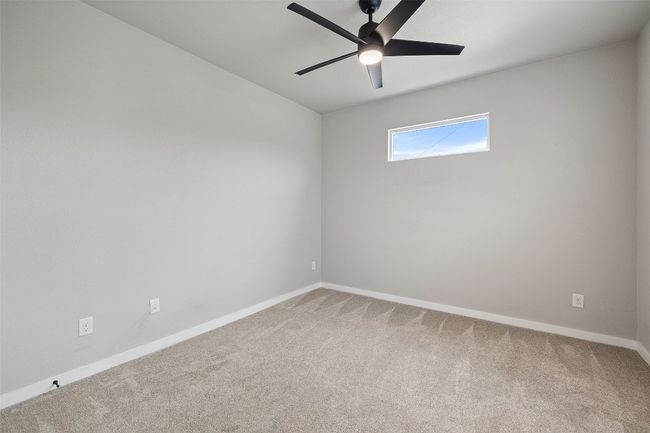bedroom 2 with carpet and ceiling fan | Image 25