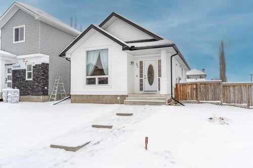 83 Bridleridge Gardens Sw, Home with 3 bedrooms, 2 bathrooms and 2 parking in Calgary AB | Card Image