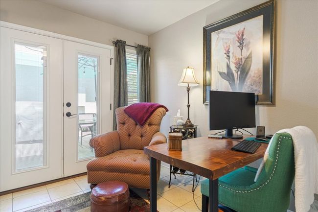 Office area featuring light tile patterned floors and french doors | Image 30