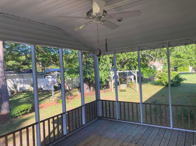 Unfurnished sunroom with ceiling fan | Image 6
