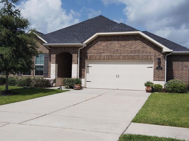 Just a reminder of how this home looks, from the charming curb appeal with a spacious driveway and inviting entrance. | Image 28