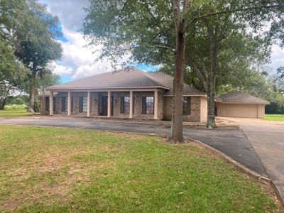 25587 Magnolia Road, Home with 3 bedrooms, 2 bathrooms and null parking in Hockley TX | Image 1