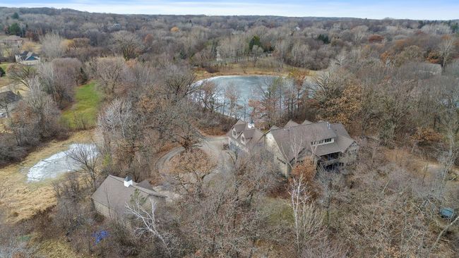 View from back looking west. Detached garage showing the two ponds that are part of the property. | Image 65