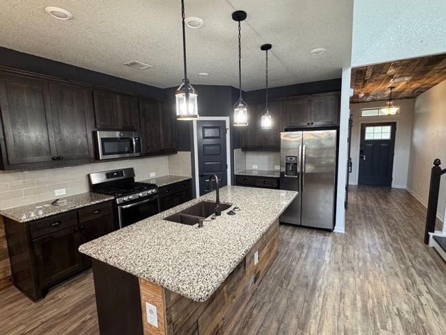 122 Sangaree Dr, House other with 4 bedrooms, 3 bathrooms and 4 parking in Buda TX | Image 5