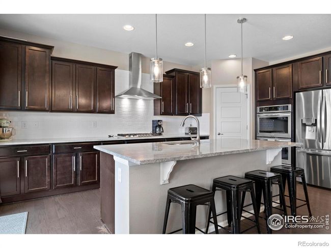 6109 Washakie Ct, House other with 6 bedrooms, 4 bathrooms and 4 parking in Timnath CO | Image 6