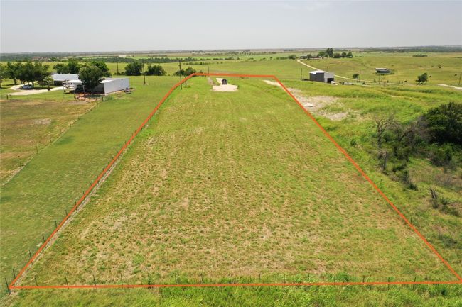 Drone Shot from back of lot looking forward (LARGE BACK YARD) | Image 11