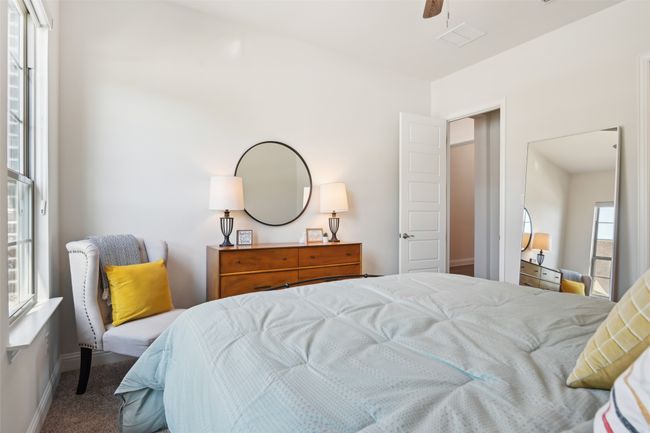 Bedroom featuring carpet flooring and ceiling fan | Image 31