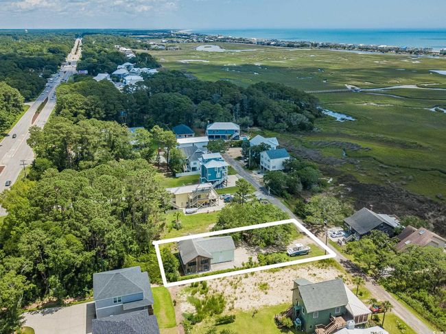 Aerial overview of property's location with property boundaries highlighted and a nearby body of water | Image 27