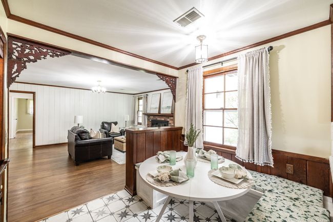 The built in kitchen nook makes a cozy spot for dining and entertaining. | Image 29