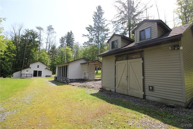 Three structures, house, cabana and shed | Image 4