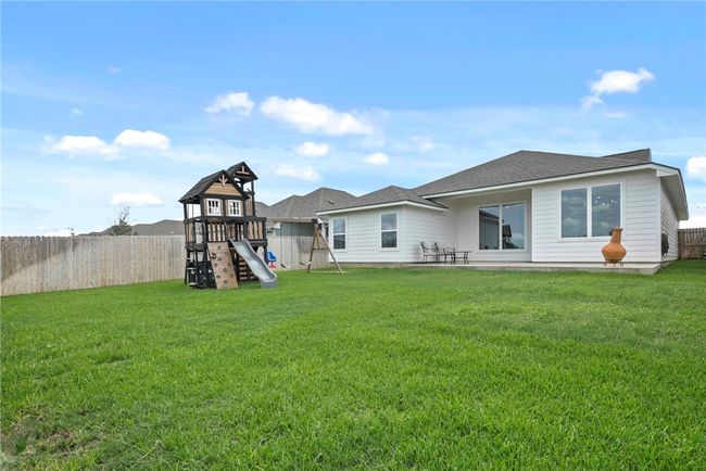 Back of property with a playground | Image 23