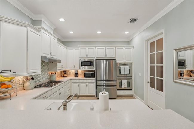 WELL APPOINTED KITCHEN WITH EXTRA COUNTER SPACE AND STORAGE! | Image 16