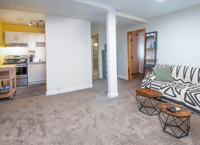 Lower level kitchen and living room | Image 32