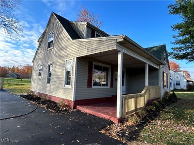 View of home's exterior featuring a porch | Image 3