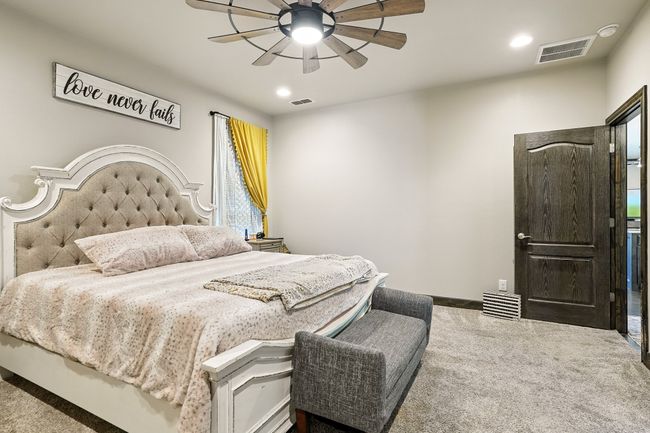Bedroom with carpet, a ceiling fan, and recessed lighting | Image 14