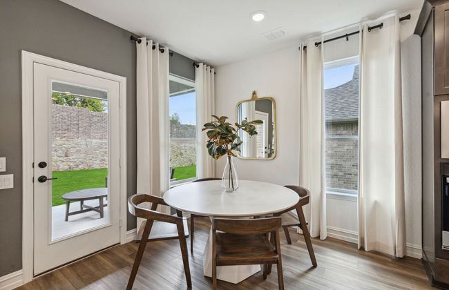Bright dining area *Photos of furnished model. Not actual home. Representative of floor plan. Some options and features may vary | Image 5