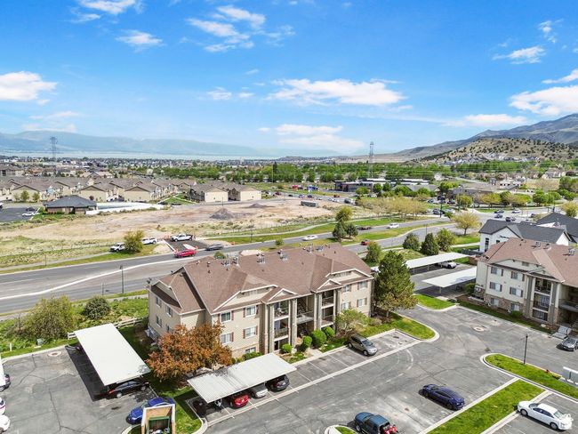 Aerial perspective of suburban area featuring a mountain backdrop | Image 28