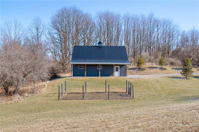 Another view of the pole barn, and fenced in garden area. Nice flat level surface to get in and out. Store all your toys or home your horses! | Image 35