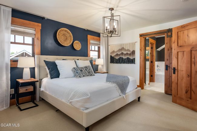 Primary bedroom with brand new remodeled bathroom | Image 15