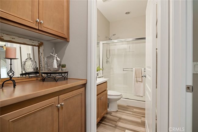 Main floor full bathroom and extra storage | Image 12