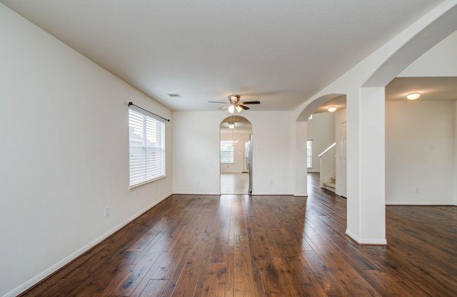 The formal dining area opens to the kitchen for easy serving. | Image 8