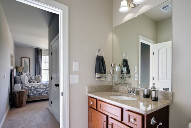 This bedroom has its own bathroom. | Image 43
