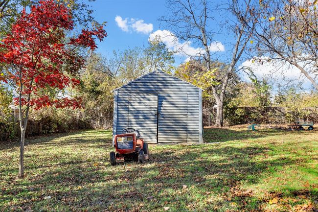 View of outbuilding with a yard | Image 4