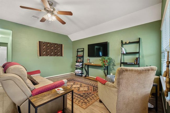 Abundant natural light poursthrough windows, creating a brightand inviting atmosphere. | Image 7
