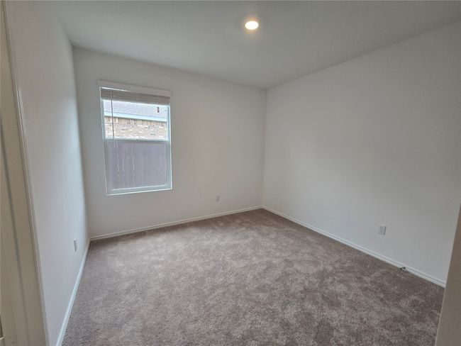 Carpeted spare room with baseboards | Image 22
