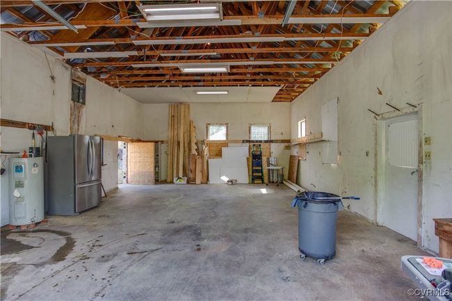 Spacious 4 car Garage with water heater | Image 46