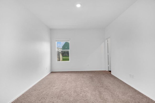 Spare room with carpet floors and baseboards | Image 12