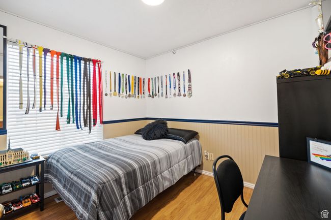 Bedroom featuring hardwood / wood-style floors | Image 26