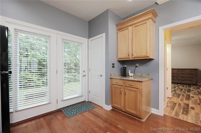 Door to fenced back patio with privacy. | Image 13
