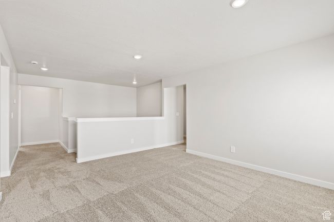 Carpeted loft featuring recessed lighting and baseboards | Image 26