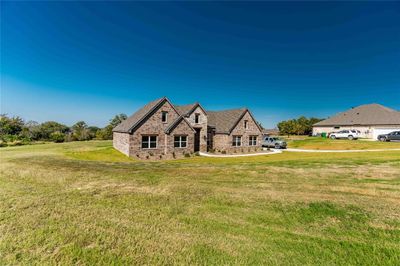 View of front of home featuring a front lawn | Image 2