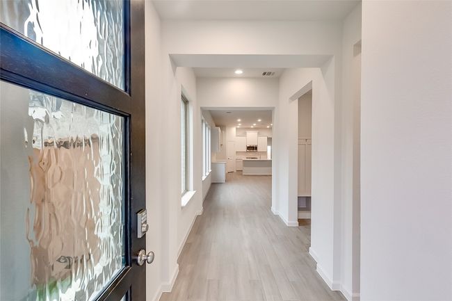 Entrance foyer featuring wood finished floors, recessed lighting, and baseboards | Image 4
