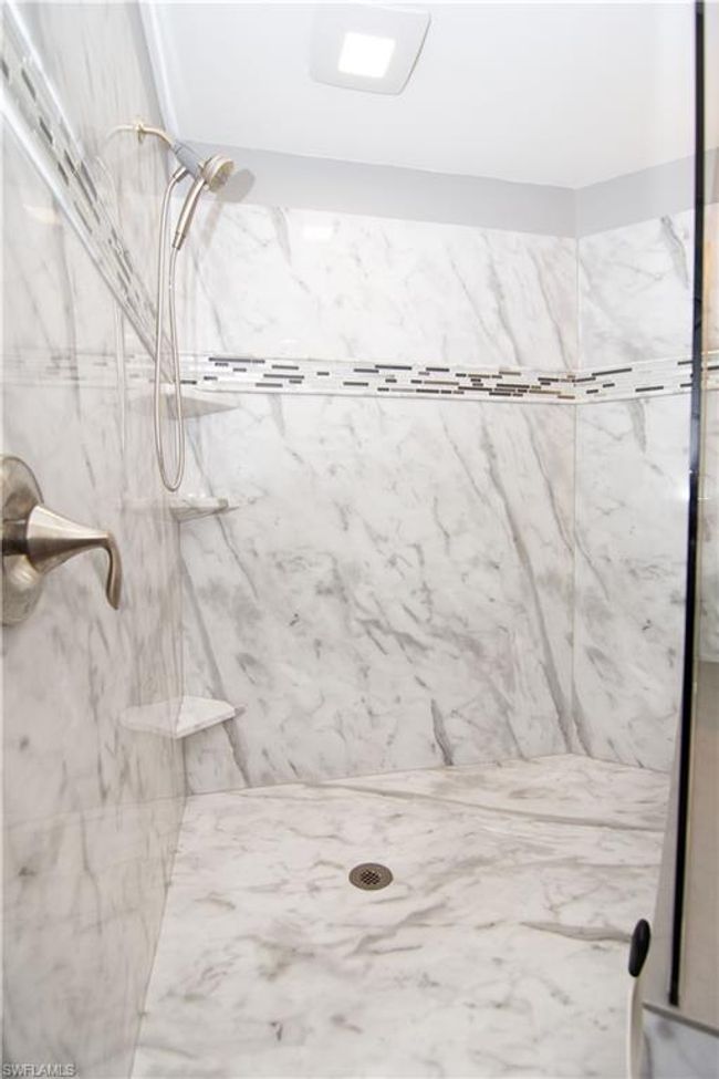 Oversized custom shower in Primary Bathroom. | Image 21